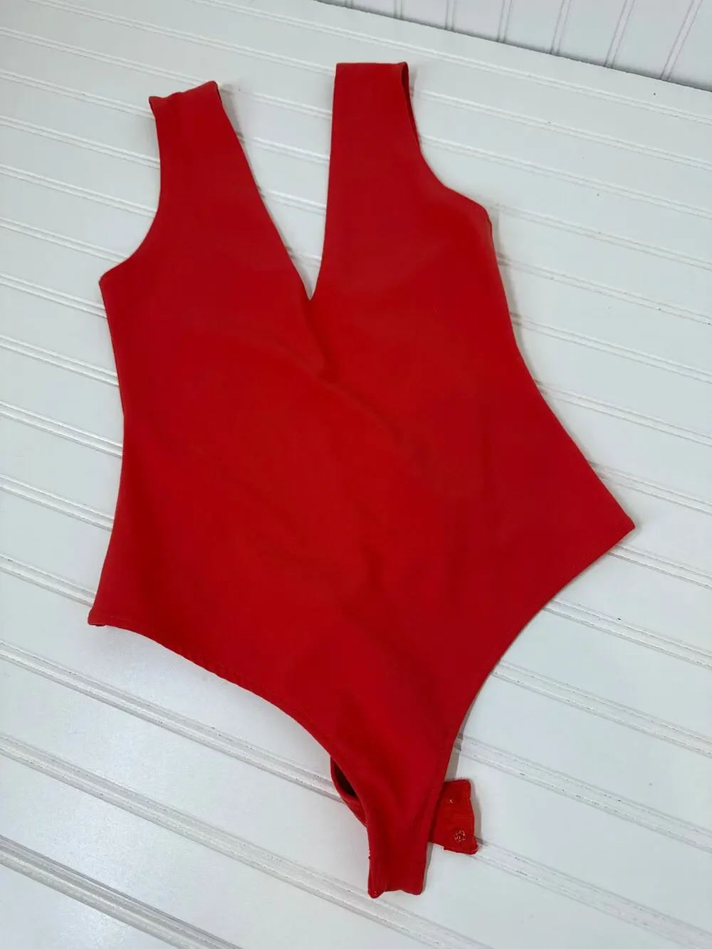 NWT Free People Keep It Sleek Bodysuit Size XS -Pink Pointsetta Scoop Back Shell